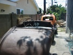 Had to remove an orange tree to get both cars on the side of the house.