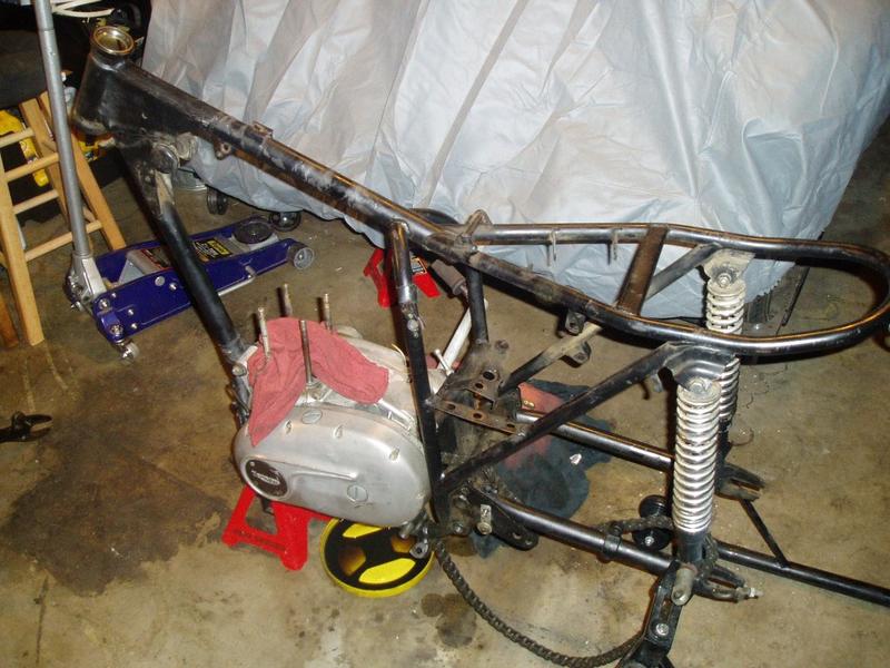Motor & swing arm / shocks are the only things left on the stock frame.
