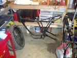 Racing frame + second swing arm. The swing arm spindle was frozen up but some persuasion with heat & Kroil got it loose.