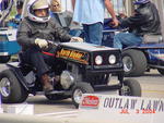 Yes, your eyes are not deceiving you - lawnmower drag racing!