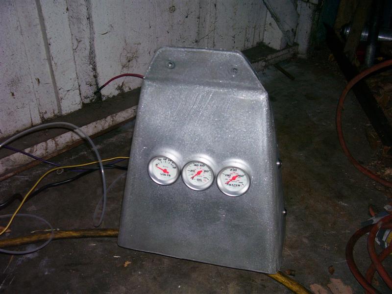 Dash panel, top. Not that I can see the gauges when I'm racing, but they will help during warm-up.