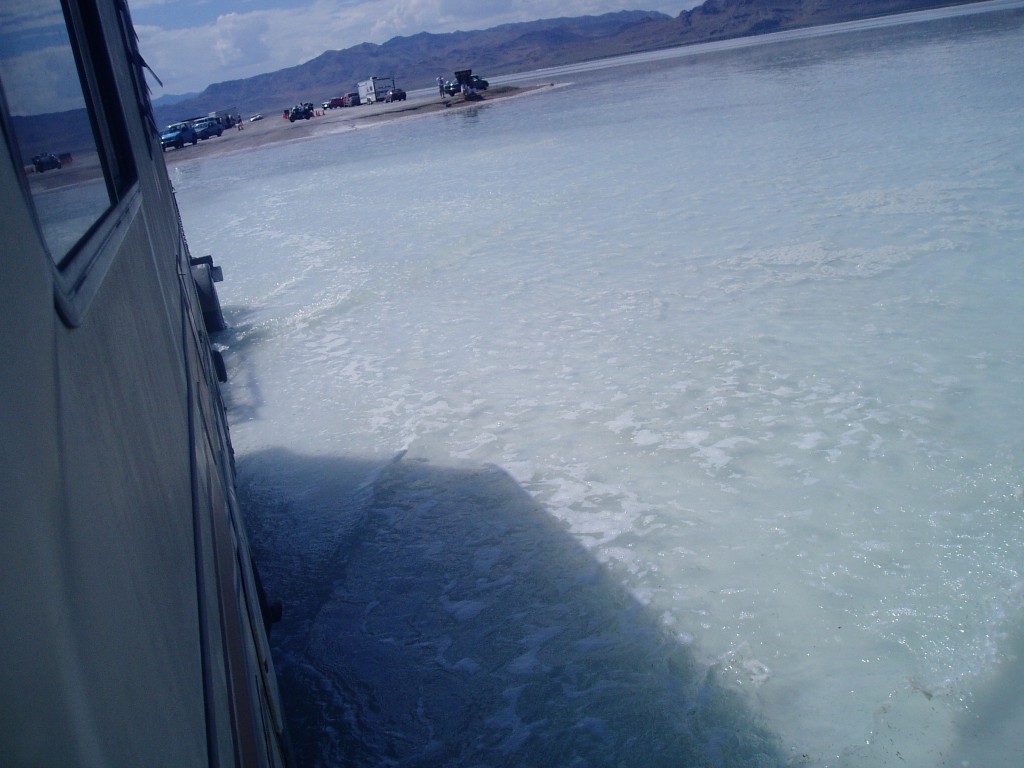 Pushing off from dry land, headed to the pits to collect bike 599.