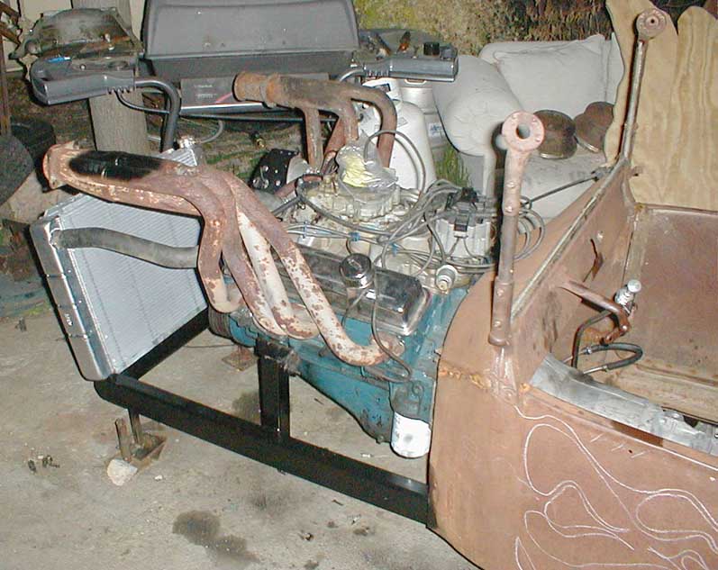 Mock-up motor removed.
Running motor and trans installed.
Test runs and loud revs follow.