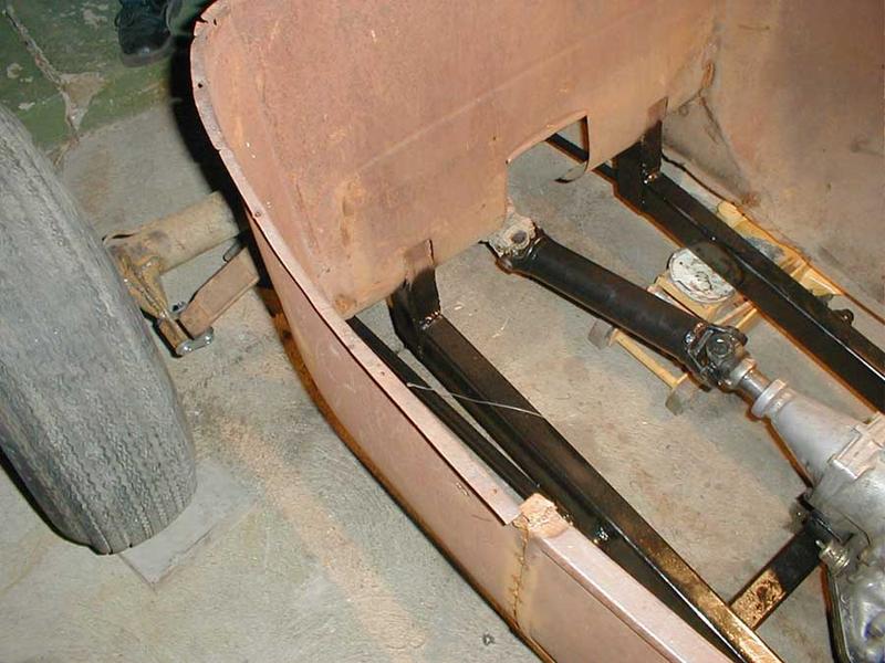 Driveshaft arrives and gets installed.
Notice the new frame paint.