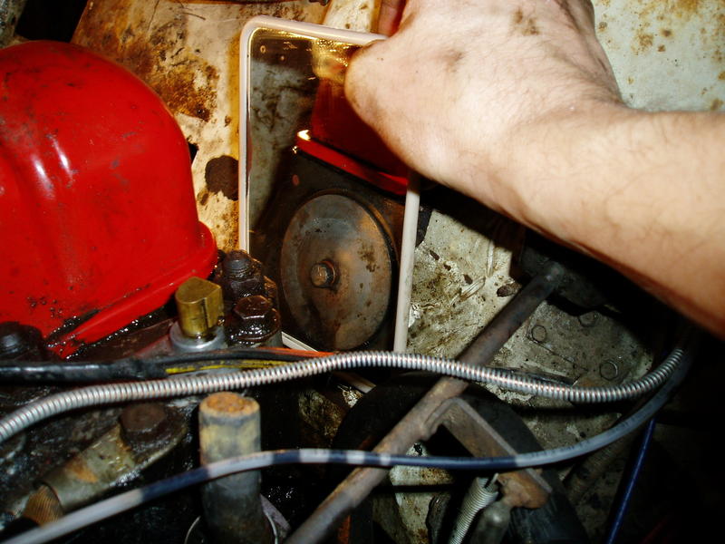 This is a view of the removable freeze plug on the back of the motor. It leaks. I have to decide whether to remove it and risk s