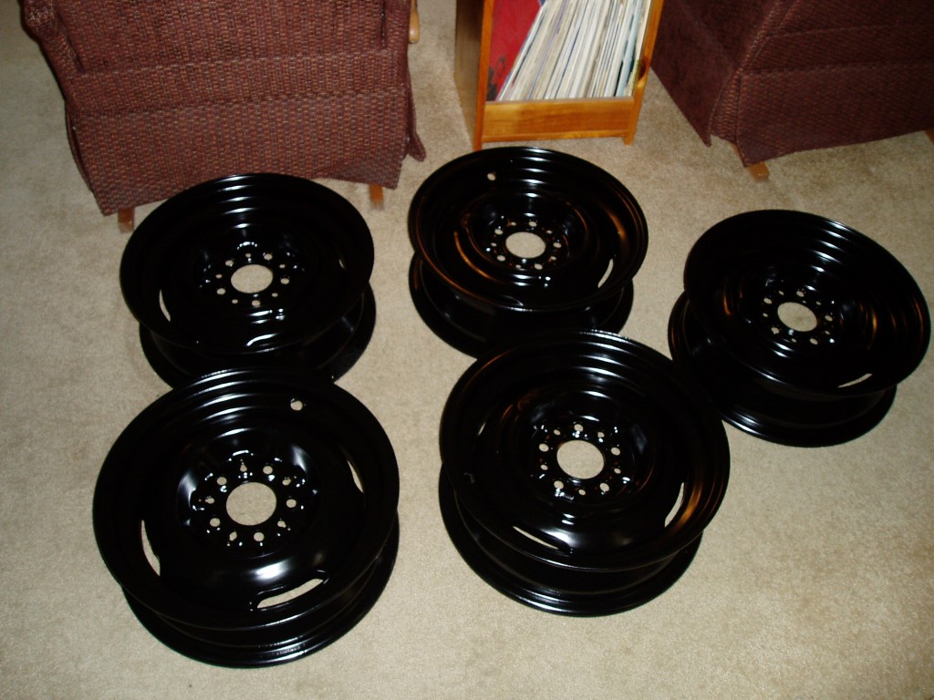 Bling! I took the wheels to a powdercoat place. Pricey, but I won't worry about wheels for a long time.