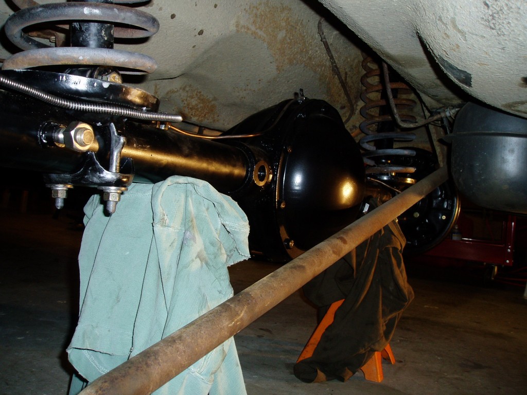 Sun 4/8/06. Rear shocks & springs mounted.