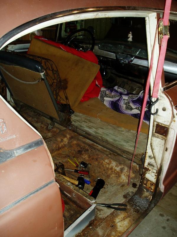 Saturday 3/3/2007. The problem door is finally off. Unfortunately, the brackets where the door hinges bolt to the body are not s