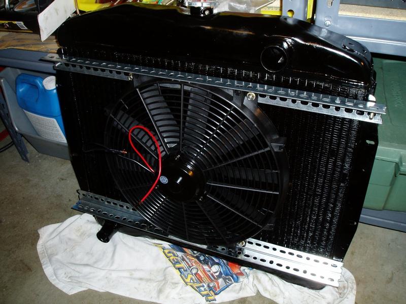 Freshly re-cored radiator with new fan & brackets.