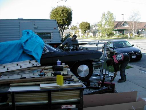 Joshua & I starting to pull the Caddy motor.