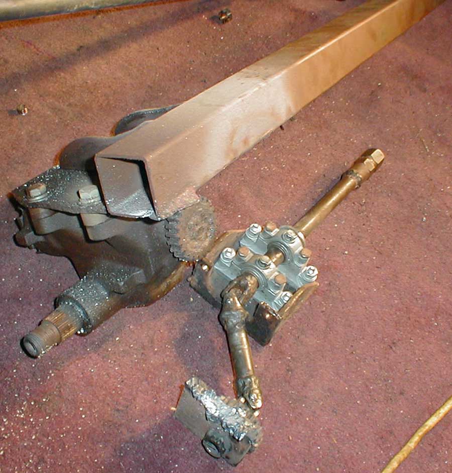 The old steering column, reverser mechanism, and saginaw box completely removed.
Good Fucking Riddance.