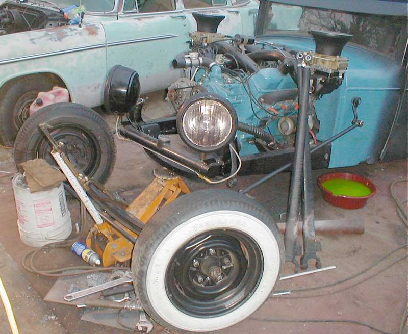 Going backwards to adjust ride height.
Perch and lower shock mounts cut.
The car looks like a sponge monkey.