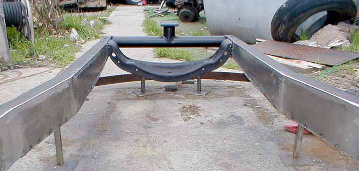 Frame rail boxing top edges near complete.