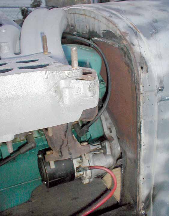 Recessed firewall just barely clears valve cover when installed all the way up to the body tag.