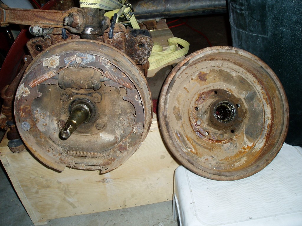 I finally got the passenger side drum off by beating it with a sledge hammer. Kinda dirty inside.