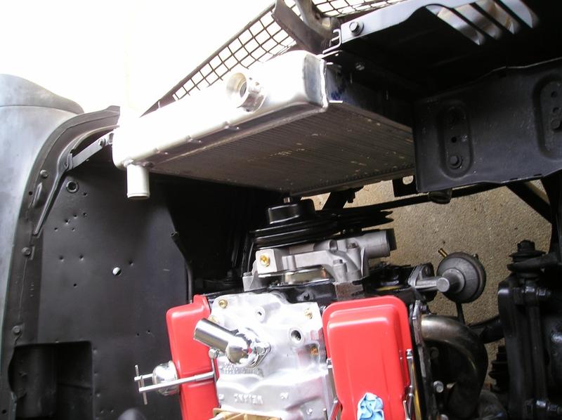 Clearance is tight so the fan will be a pusher.