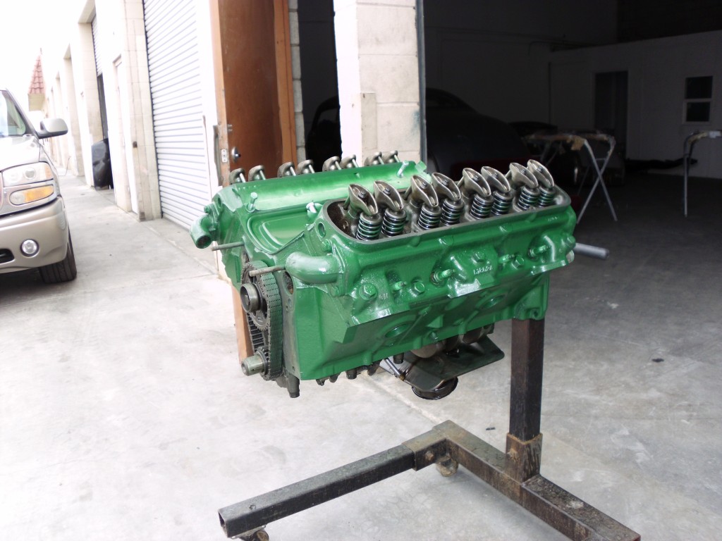 got motor clean and redy for new gaskets and threw some paint at it