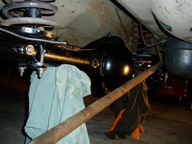 Sun 4/8/06. Rear shocks & springs mounted.