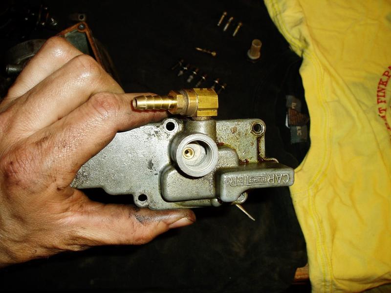 Top of needle / seat.