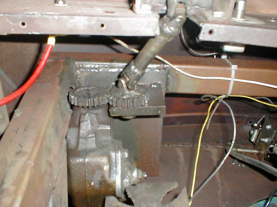 The new steering box will occupy this same real estate once all this garbage has been removed. I don't know if I should throw th