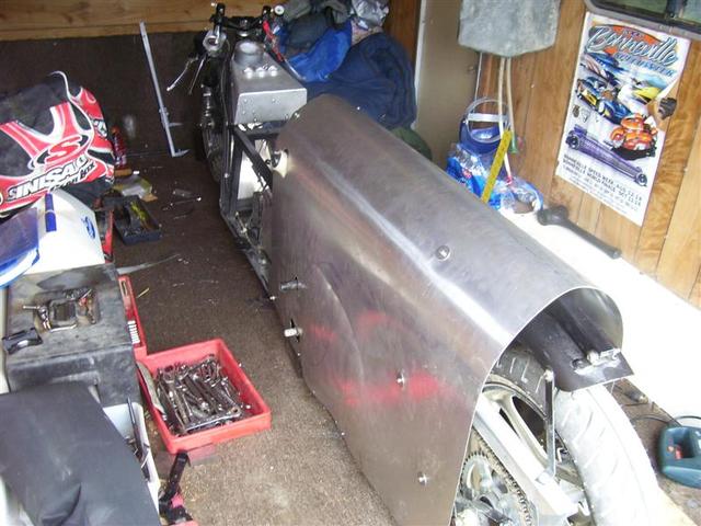 Here is the other side. I still need to make a section to cover the wheel. I can go as far back as the end of the tire & as 