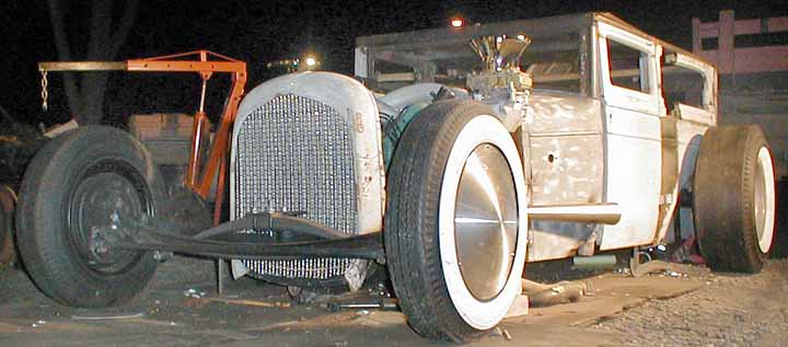 Second and final radiator is in. Back wheels and tires are on. Body patches get finished. Exhaust is finished.