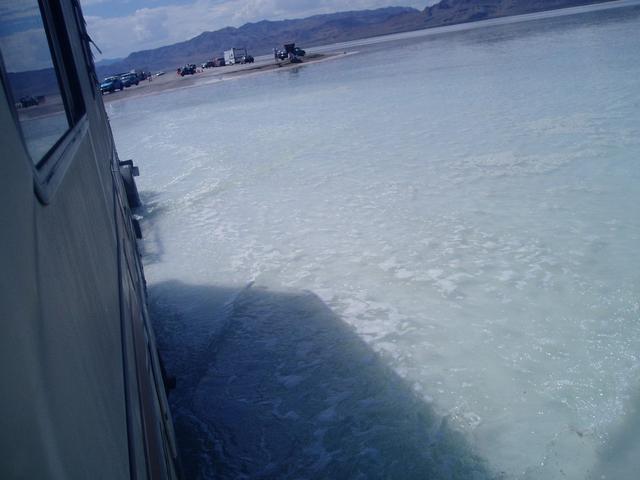 Pushing off from dry land, headed to the pits to collect bike 599.