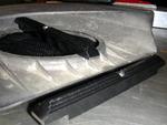 Finished scoop hold-downs.