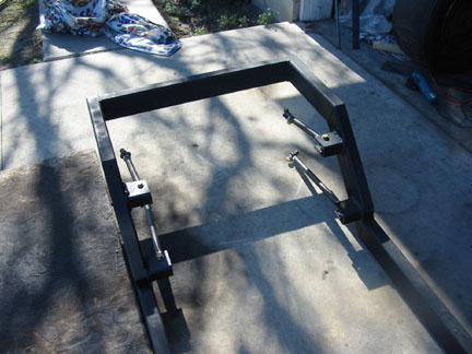 Frame with 4-links on brackets. Top links are about 12" long, botom ones are about 19" long.