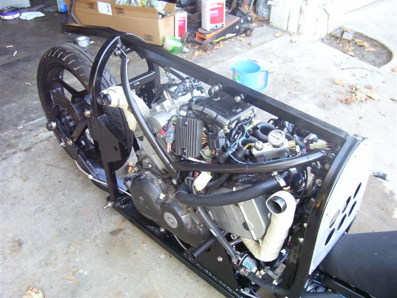 A lot of stuff packed in around the engine.