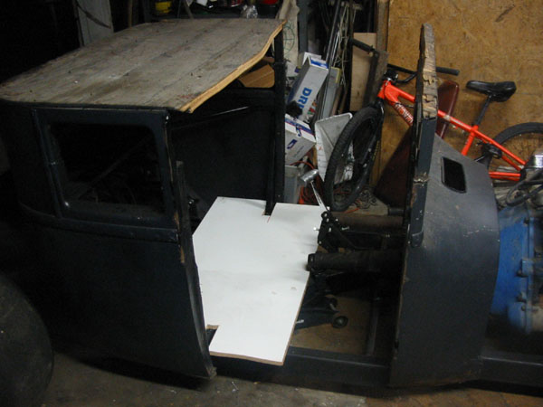 Cowl bolted to frame. Didn't get any hinges yet, so I have to hang the doors later.