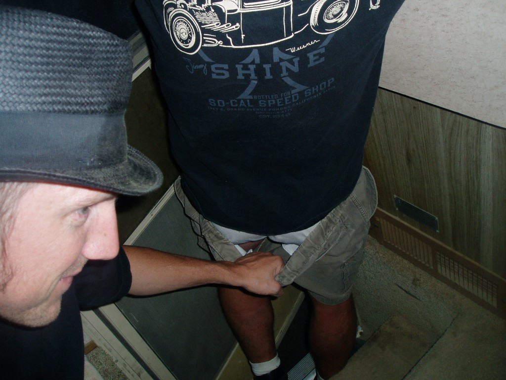 Mikey helps Jet with a personal matter. This is a man's RV - the pisser is the side door.