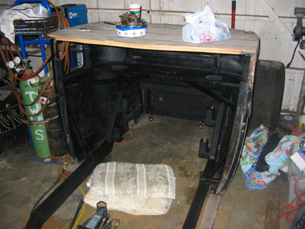 Body bolted to frame. Time to get some hinges & hang the doors.