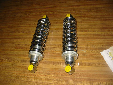 Since I'm not sure of the weight on the back end, I bought new (shame,shame) Carrera coil-overs for the rear. Plus, I couln't fi