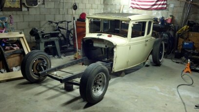 Body placed on the car with front end to check angles and measurements. 