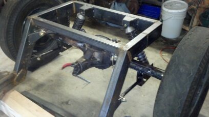 Fabricated some top coil over mounts and integrated the bottom mounts into the bottom four link mounts.