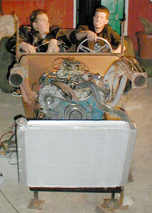 You can even squish PopTart in there.
He likes the way the pinon straps tickle his butt cheek when Brian stabs the throttle.