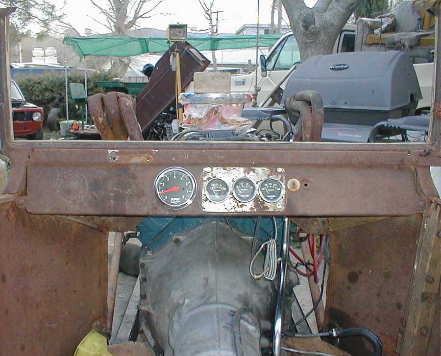 Gauges are in. It's nice having rusty 18ga sitting around so you can have your instrument cluster panel match the dash.